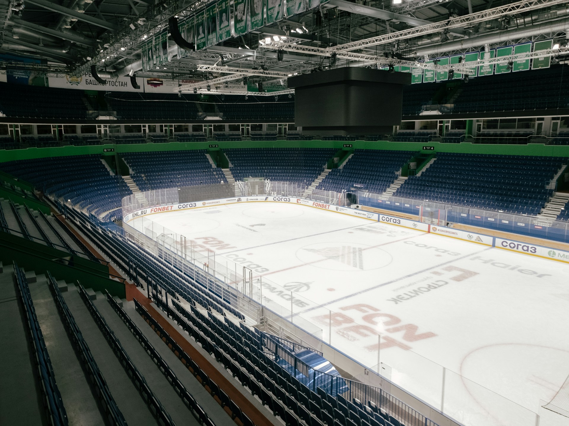 Empty hockey arena lit for broadcast, representing the MSG-GO streaming platform back-end